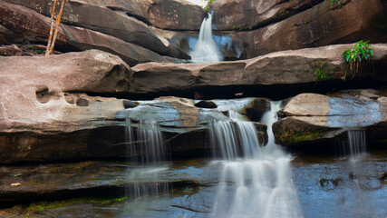 waterfall in a river with silk teepee water