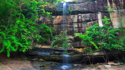 waterfall in a river with silk teepee water