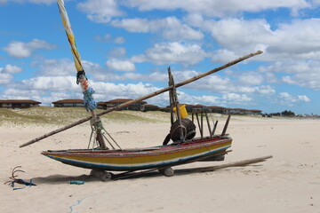 Fototapeta na wymiar Wooden boat in Brazilian Beach 