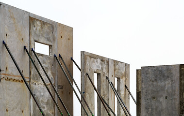 Concrete panels of a construction site with props holding panels in place