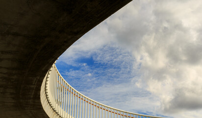 bridge over the river with clouds