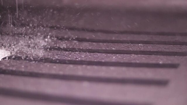 water drops falling from shower bathroom slow motion
