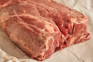 A raw, fresh chuck roast of beef from an artisan butcher in central Pennsylvania, USA. This is sometimes called "stewing steak."