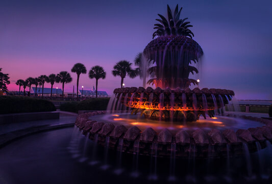 Colorful sunset scene with the Pineapple fountain at The Waterfront Park
