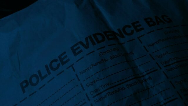 Police Evidence Bag In Flashing Lights