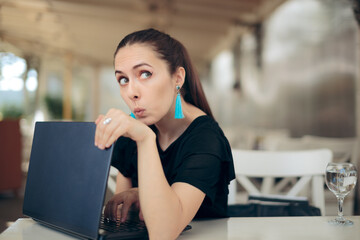 Woman with Laptop Worried About Online Privacy of Personal Data