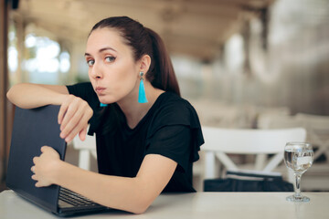 Woman with Laptop Worried About Online Privacy of Personal Data