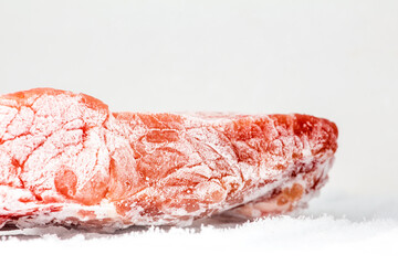 Frosted meat in a freeze chamber