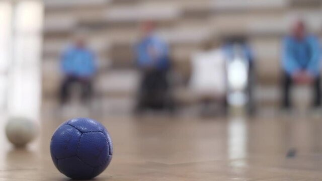 Paralympic sport playing boccia slow motion