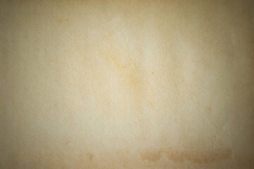 yellowed blank sheet of old paper close, soft focus