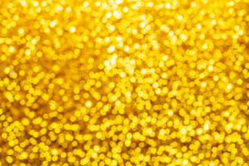 gold abstract background with bokeh defocused lights