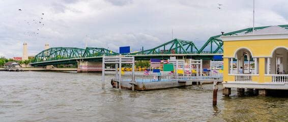 Fototapeta na wymiar The Memorial Bridge is a bridge over the Chao Phraya River in Bangkok, in Thailand, connecting the districts Phra Nakhon and Thonburi