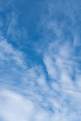 blue sky background filled with unique shape of clouds