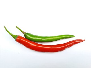 Fresh peppers with green and red on white