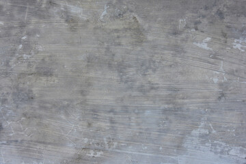Old wall background with cemen texture in white and grey color. can be used as background and wallpaper.