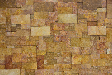 wall of natural stone, travertine, marble, slate, sandstone. can be used as background and wallpaper.