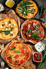Fototapeta na wymiar Freshly prepared Italian pizza