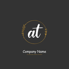A T AT Initial handwriting and signature logo design with circle. Beautiful design handwritten logo for fashion, team, wedding, luxury logo.