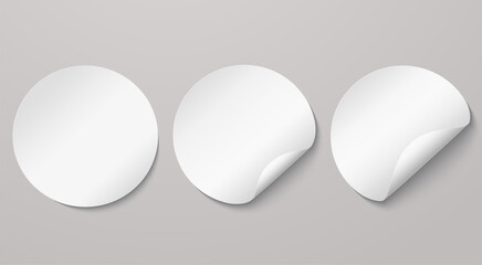 White round adhesive stickers with curved edges. Empty note mockup, ad sticker with turned edge.
