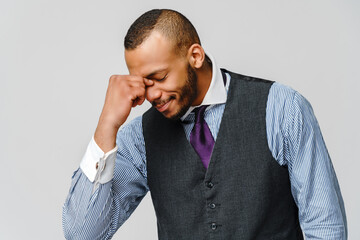 Young afro american businessman touching head because of headache and stress