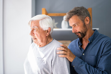 Old Senior Man With Dementia Getting Support And Care