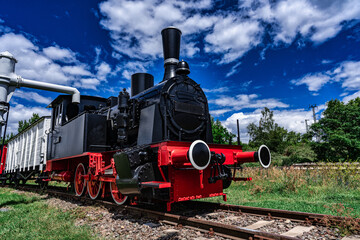 Fototapeta na wymiar Black historical steam locomotive