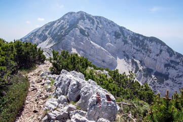 Fototapeta na wymiar Touristic trail Alta Via del Monte Baldo, ridge way in Garda Mountains