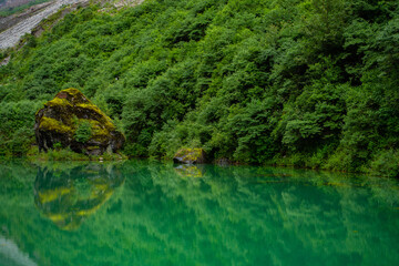 The Jade lake in Conch Gully of Sichuan, China, with reflection.