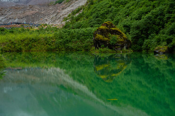 The Jade lake in Conch Gully of Sichuan, China, with reflection.