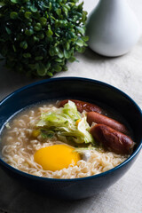 ramen with egg yolk and Japanese hotdog