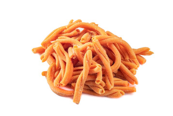 Fresh Gemelli pasta with carrot flavor isolated on a white background