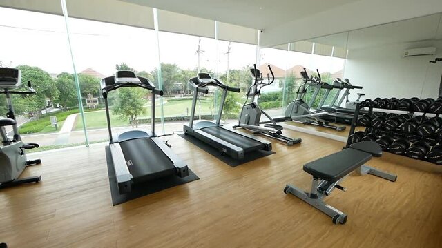 Modern and Clean Gym Decoration With Equipments