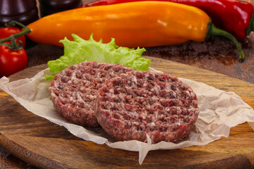 Raw burger cutlet