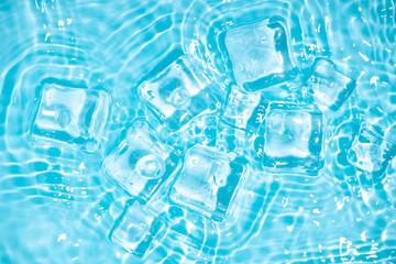 Cool and transparent ice cubes in summer