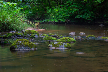 A small rocky river in spring Taken in Latvia, Raunis river