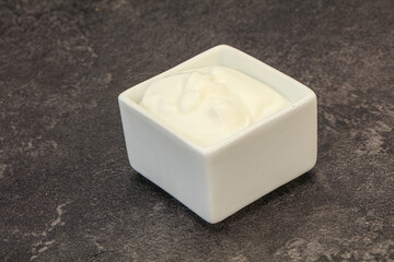 Sour cream in the bowl