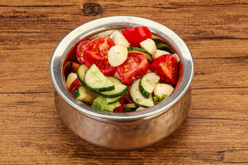 Salad with vegetables and mozzarlla