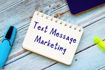 Conceptual photo about Text Message Marketing with handwritten text.