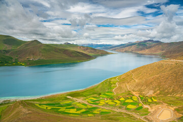 Naklejka na ściany i meble Yamdrok Tso, a sacred lake in Tibet, China, in summer time.
