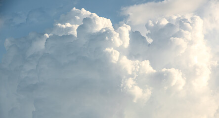 Naklejka na ściany i meble Beautiful motion blur cloud shape on blue sky