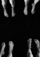 Abstract top view. Feet in the water - 368592559
