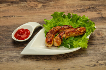 Roasted chicken white sausages with ketchup
