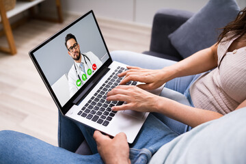 Fototapeta premium Pregnant Couple In Online Video Conference Call