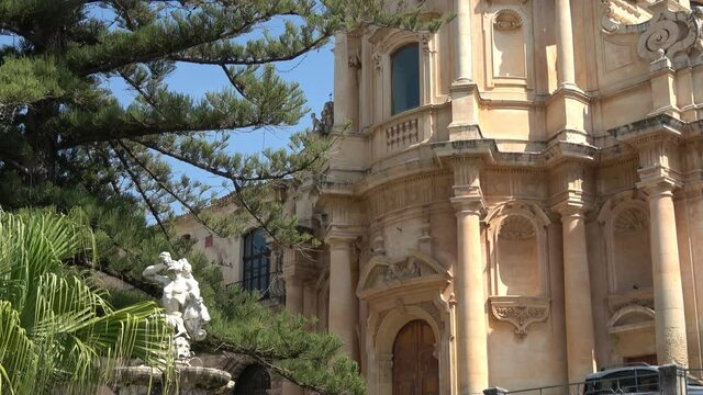 Sicily, Noto town the Baroque Wonder - UNESCO Heritage Site. Fountain of Hercules and San Domenico church