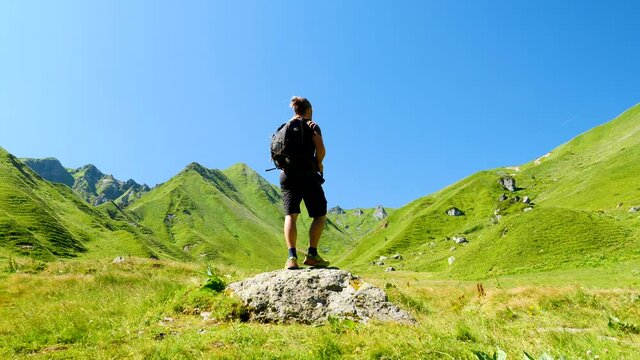 man hiking in mountain- France landscape outdoor activity