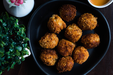 Korokke or Japanese potato croquettes  are made from mashed potato mixed with ground beef and carrots then deep fried