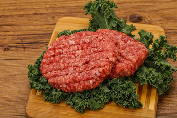Raw beef burger cutlet for cooking