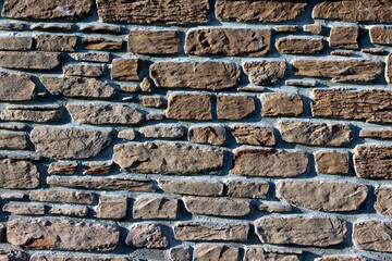 Brown and gray stone brick wall, masonry background