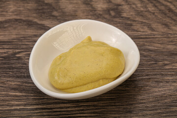 Dijon mustard sauce in the bowl