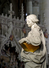 baroque sculpture on a gothic background